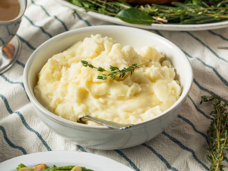 Creamy mashed potatoes in a serving bowl