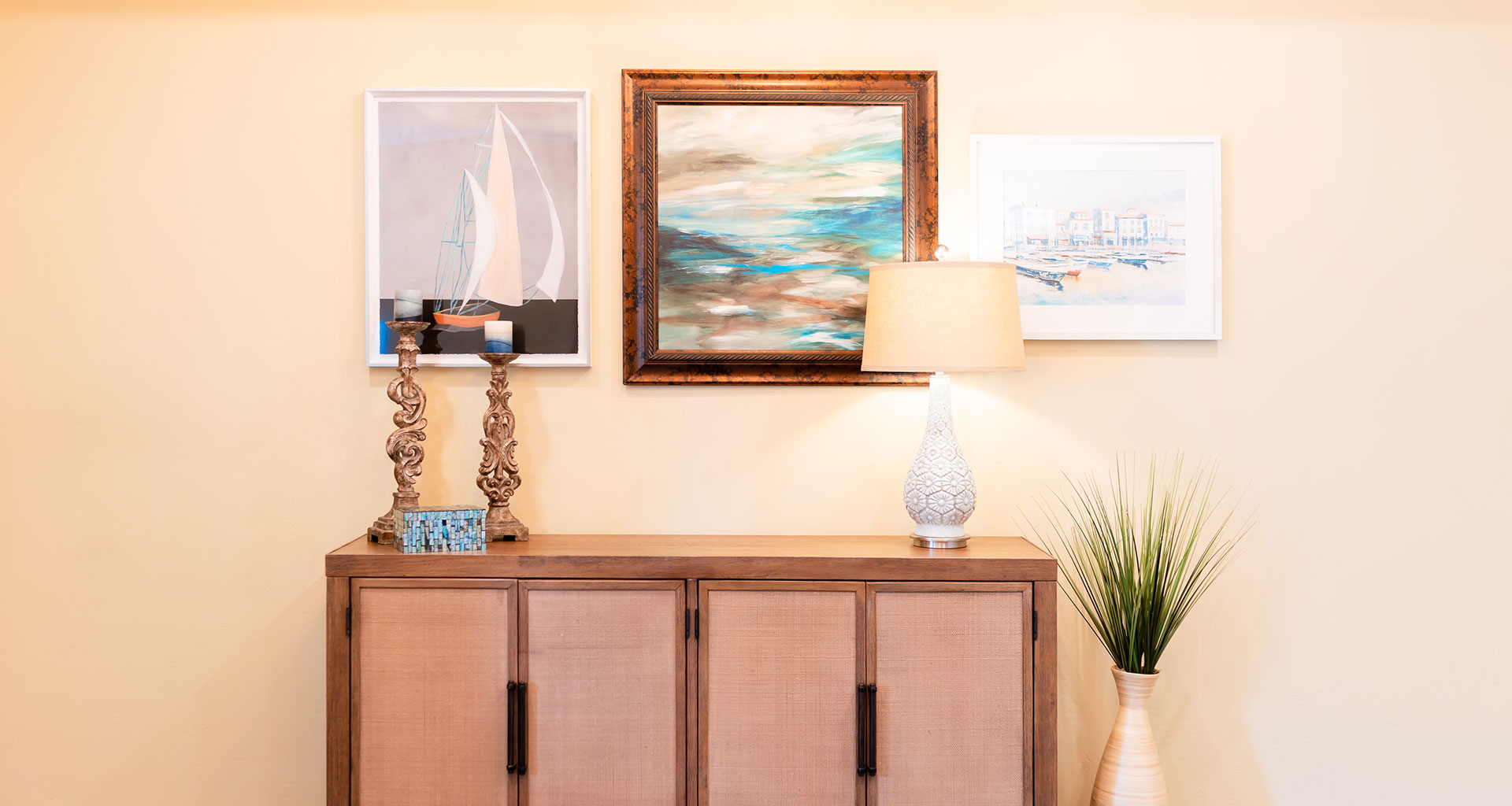 Paintings and a cabinet